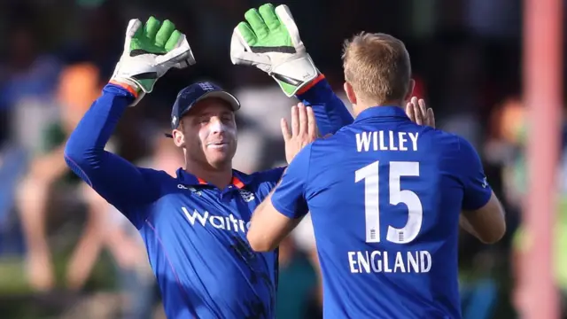 Jos Buttler and David Willey celebrate