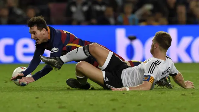 Lionel Messi is fouled for a Barcelona penalty