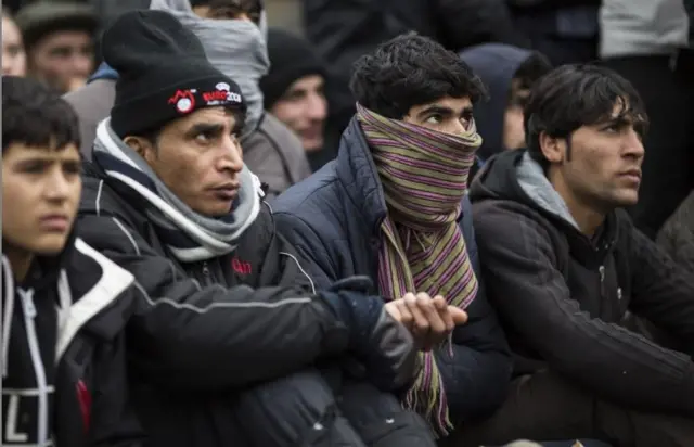 Actors from Shakespeare's Globe perform Hamlet to migrants at the Good Chance Theatre Tent in the Jungle Refugee Camp