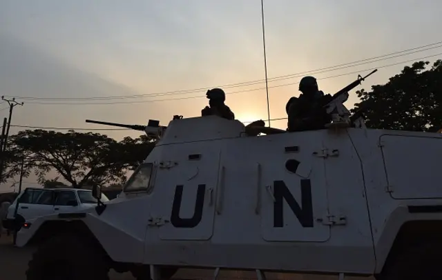 UN peacekeeping forces patrol during presidential and legislatives elections in the streets of the Muslim PK-5 district of Bangui on December 30, 2015
