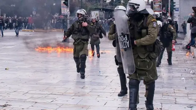 Riot police and protestors in Athens