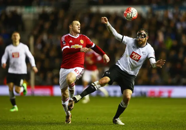 Richard Keogh in action against Manchester United