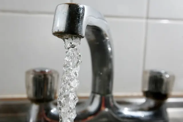 A running kitchen tap