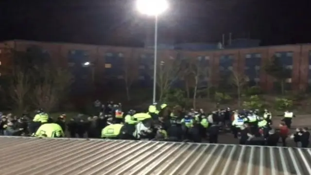 Police and fans at Oxford United and Millwall FC match