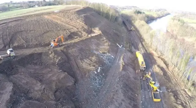 Removing debris from the landslip