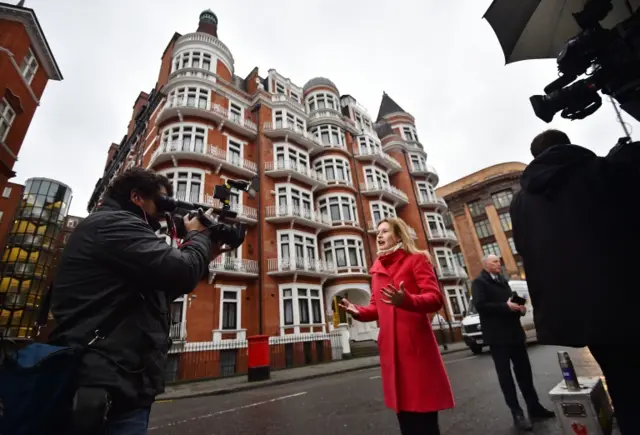 Journalists outside the Ecuadorean embassy in London