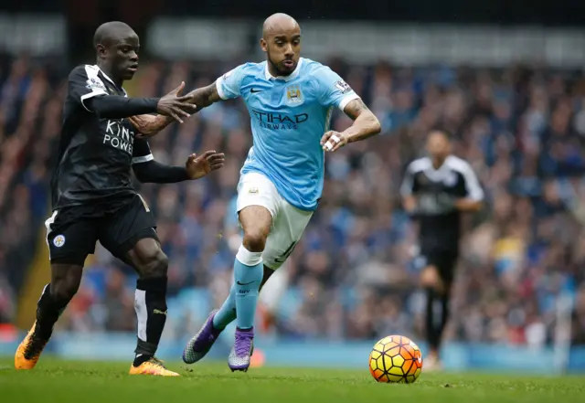 Leicester City's French midfielder N'Golo Kante vies with Manchester City's English midfielder Fabian Delph