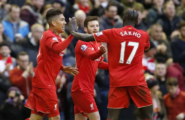 Roberto Firmino celebrates