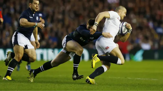 Mike Brown is tackled