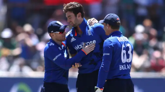 Eoin Morgan congratulates Reece Topley