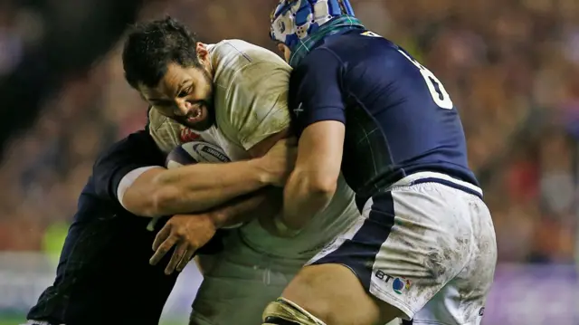 Billy Vunipola is tackled