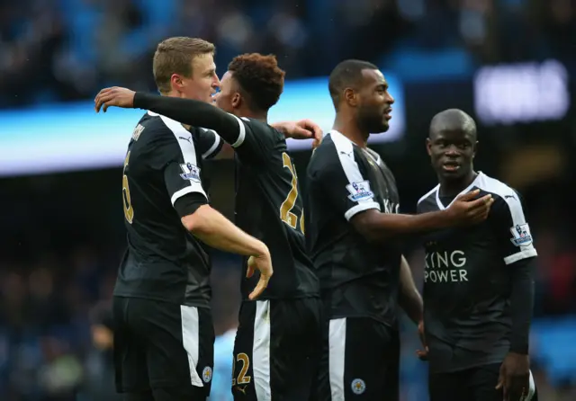 Robert Huth, Demarai Gray, Wes Morgan and Ngolo Kante of Leicester City celebrate their 3-1 win