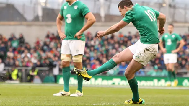 Jonny Sexton kicks a penalty