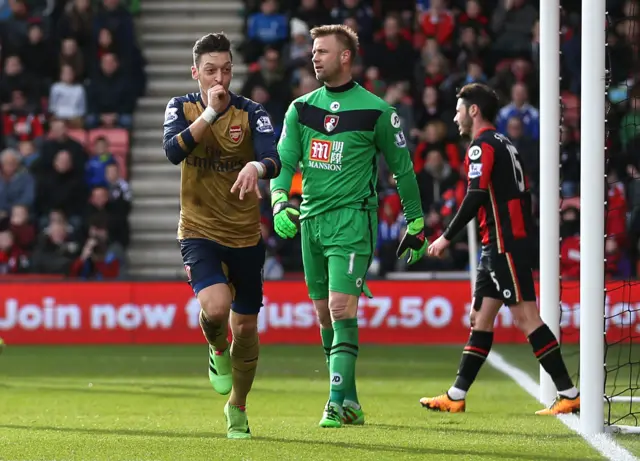 Mesut Ozil celebrates