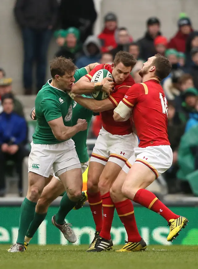 Andrew Trimble tackles Liam Williams