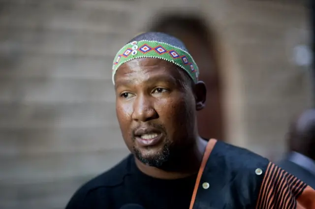 Mandla Mandela, Nelson Mandela's grandson, wearing traditional Xhosa clothes, arrives for the Opening of the South African Parliament on June 17, 2014, in Cape Town