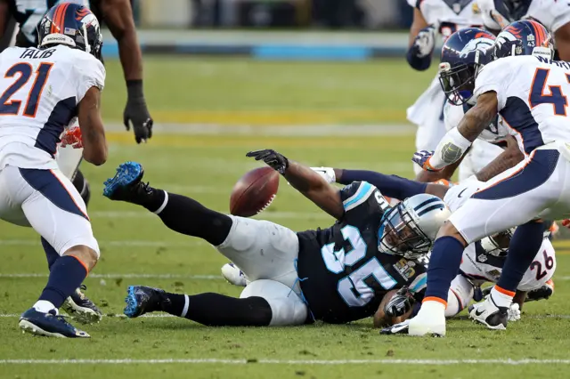 Mike Tolbert fumbles the ball