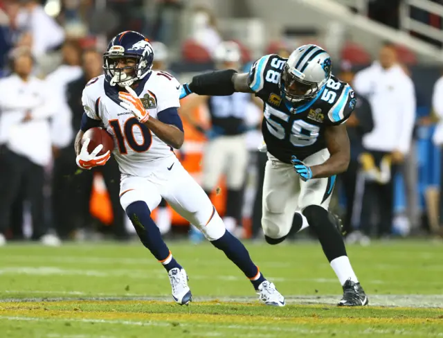 Emmanuel Sanders runs with possession