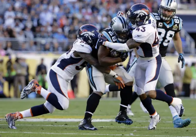 Jonathan Stewart is tackled