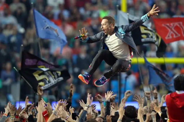 Chris Martin jumps