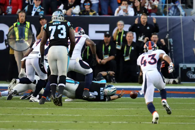 Cam Newton fumbles the ball