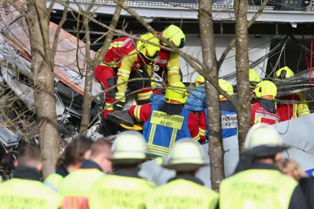 Rescuers in the wreckage