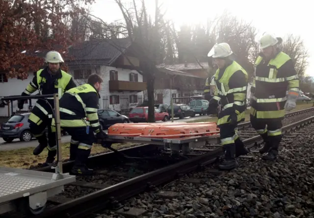 Rescue workers with stretchers