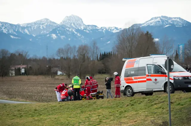 Emergency doctors work at the site of a train accident near Bad Aibling, southern Germany, on 9 February 2016