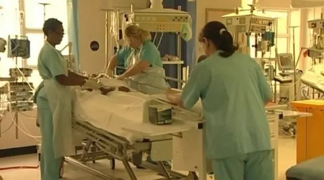 Surgeons carrying out transplant