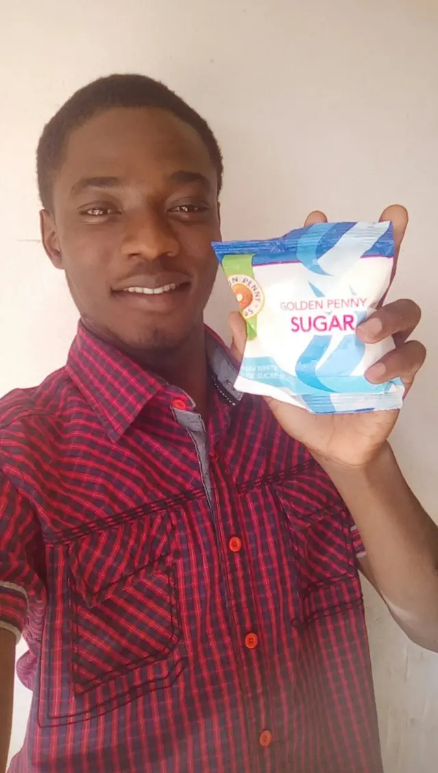 Selfie with bag of sugar