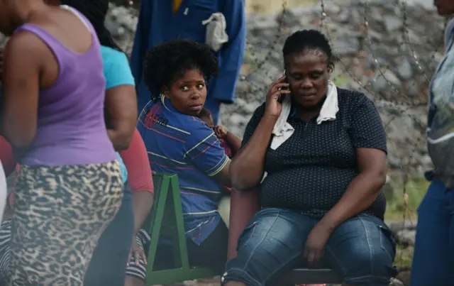 Families waiting at mine