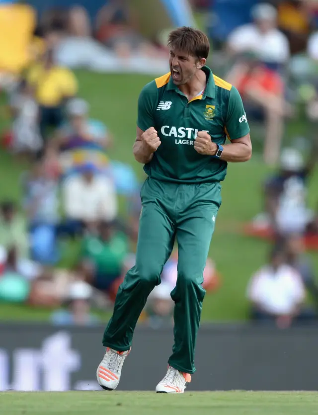 David Wiese of South Africa celebrates dismissing England captain Eoin Morgan