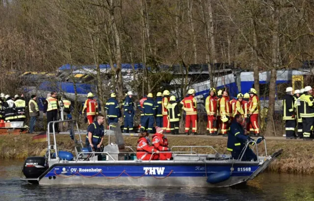 Rescuers arrive by boat