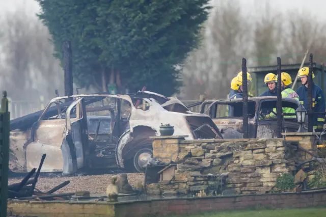 Destroyed cars at Thorney