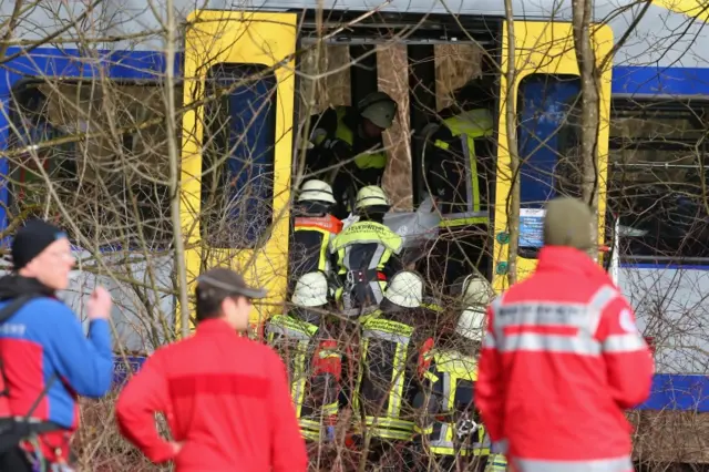Rescuers inside the train