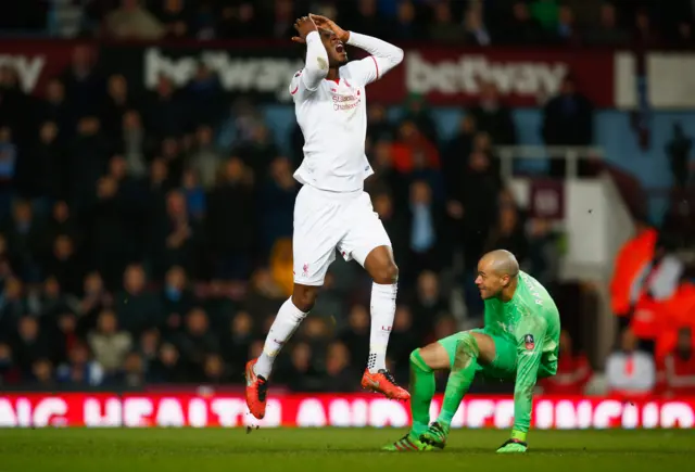 Christian Benteke of Liverpool reacts