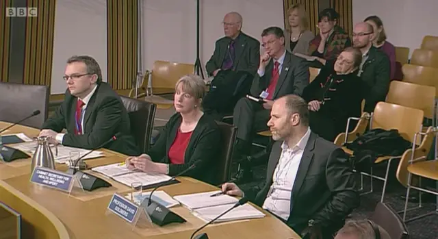 Shona Robison gives evidence to the Health Committee as the public gallery watch on