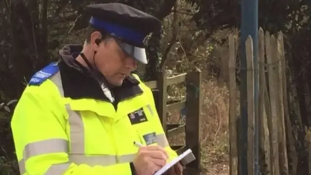 Policeman at the scene where the baby's body was discovered