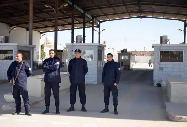 Tunisia police stand guard at the Tunisia Libya border in November 2015