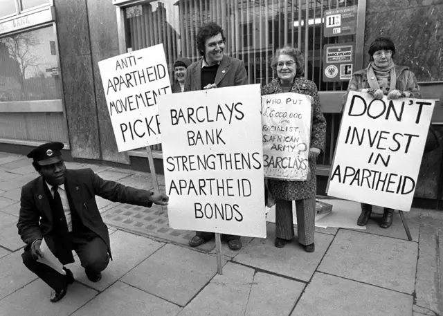 Anti-Apartheid demonstration outside Barclays Bank in Putney, London in protest at the bank buying 6.5 million worth of South African Defence Bonds.