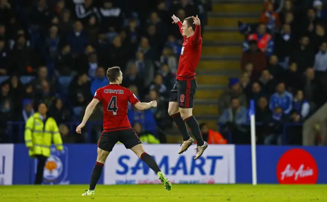 Craig Gardner celebrates