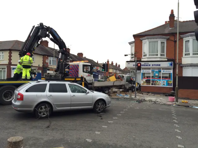 Shop damaged in crash