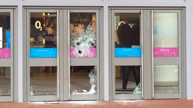 Smashed front doors of intu Potteries