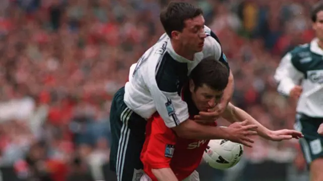 Robbie Fowler and Denis Irwin