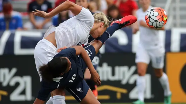 Steph Houghton makes a header against France