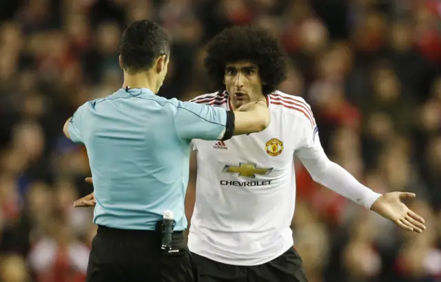 Marouanne Fellaini is booked