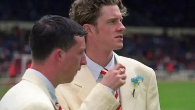 LFC team in cream suits