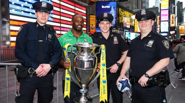 London Irish's Topsy Ojo with New York cops