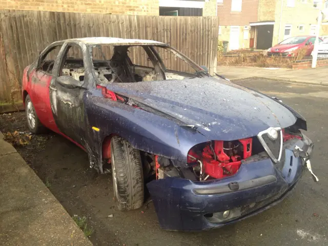 One of the burned out cars