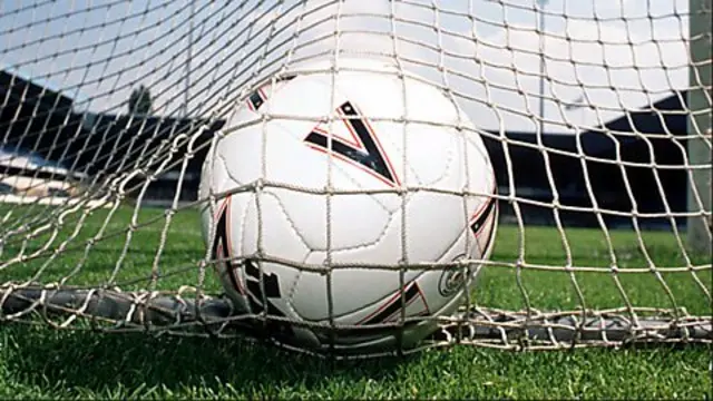 A football in the back of the net